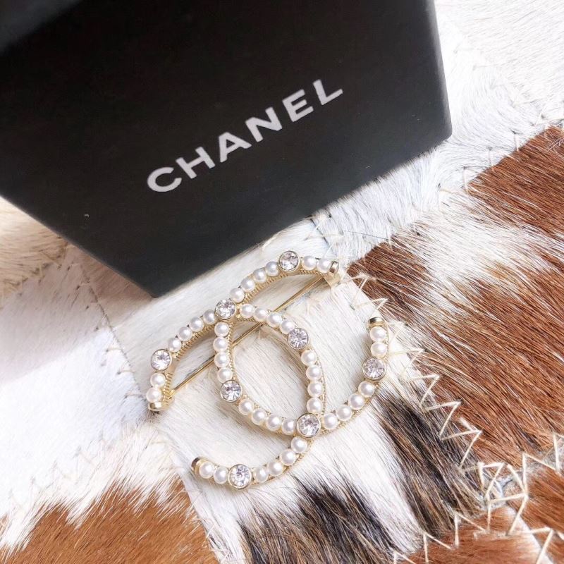 Ch*el brooches
